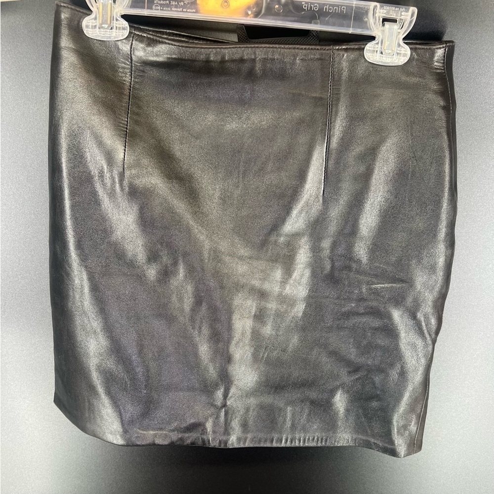 Ann Taylor black genuine leather skirt a-line above knee size ten back zipper 10